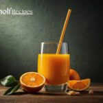 orange juice in a glass with slices